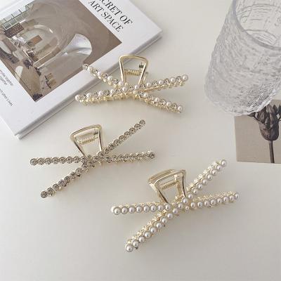 China Girls hair decoration 11cm alloy pearl rhinestone X shap handle cross big adjust designer hair slings claw clip for sale