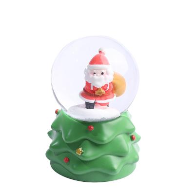 China Custom Europe Souvenir Glass Water Globe Resin Christmas Christmas Decoration Santa Claus Snow Ball for sale