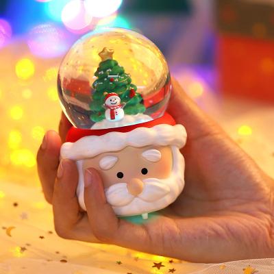 China Europe Christmas Resin Ornament Winter Ornament Suppliers Santa Crystal Ball Children Snow Globe for sale