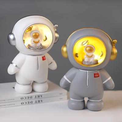 China Astronaut Polyresin Piggy Bank From China, With Led Lights Gift Enough For Kids Piggy Banks High Quality Piggy Bank for sale