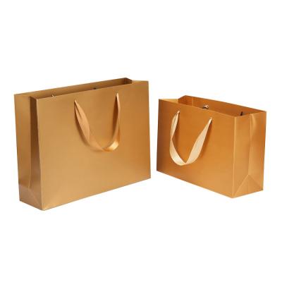 China Matt Laminated Coated Cardboard Custom Luxury Handmade Logo Paper Bag for sale