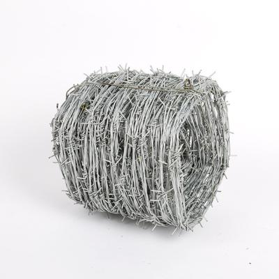 China Barbed Wire Fence Real Galvanized Cheap Price Security Part Per Roll For Crafts Barriers And Ball Deterrents for sale