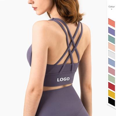 China Sexy Sports Bra Top Solid Color Gym Women Crop Back Strappy Antibacterial Custom Logo Antibacterial Running Vest Active Workout for sale