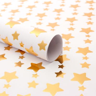 China Wholesale 50*70cm 90g Art Paper Gold Stamping Fancy Gift Wrapping Moisture Proof Paper From SY Manufacturer for sale