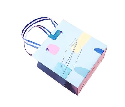 China New Fashion Materials SY Recycled Metal Buckle Handle Metal Buckle Gift Shopping Cheap Wide Paper Bags With Colorful Printing for sale