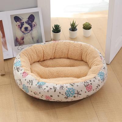 China Comfortable Soothing Dog Bed Donut Washable Warm Breathable Faux Fur Pet Bed Custom Soft Dogs Bed for sale