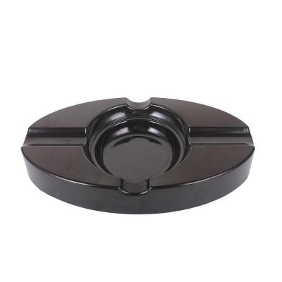 China Luxury Black Ash Tray Custom Logo High Quality Oval Atmospheric Non-slip Bakelite Cigar Ashtray /Indoor/Patio/Home/Office Cigar Rest for sale