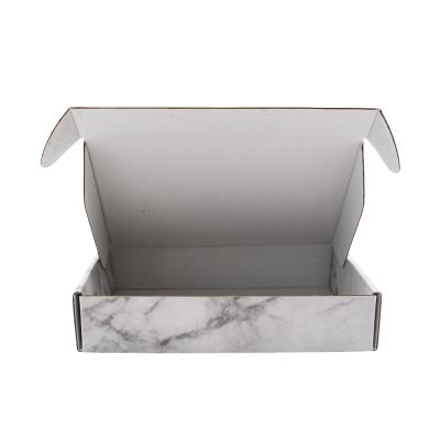 China Recycled Materials Paper Gift Boxes Die Cut Corrugated Clothing Packing Box for sale