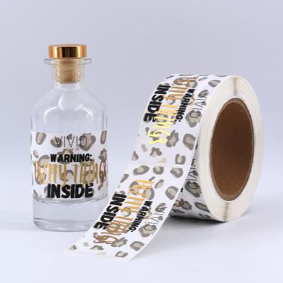 China Amazon Waterproof Hot Sale Custom Logo Printed Roll Adhesive Sticker Vinyl Stamping Bottle Labels Gold Foil Sticker For Packaging for sale