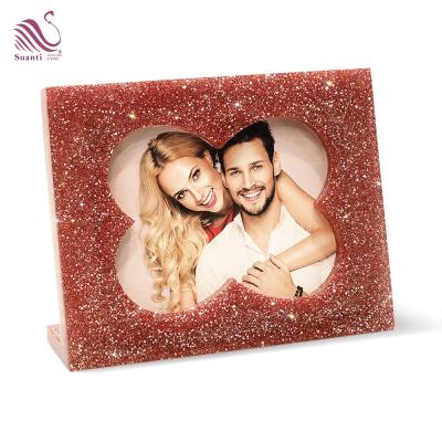 China Eco-friendly custom multy picture frame decoration Nordic Suanti Resin Christmas photo frame for sale