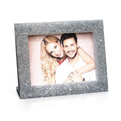 China Eco-friendly Suanti Twinkle Large Liquid Crystal Picture Frame Customize Resin Photo Frame for sale