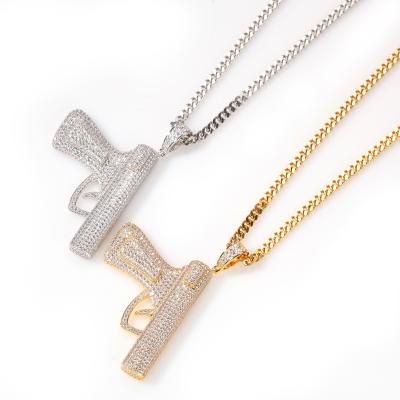 China Hiphop Gun Pendant Necklace Sweater Chain Metal Texture Jewelry Hip Hop Pendants Long for sale