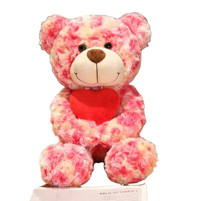 China Cute Fun New Custom Soft Stuffed Teddy Bear Plush With Heart Pillow Toy for sale