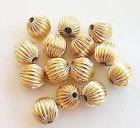 China METAL Large 8mm 14k Solid Gold Fluted Wavy Spacer Beads for sale