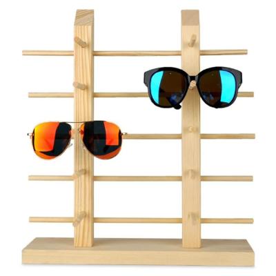 China wood rack solid wood glass display rack sunglasses display rack en venta