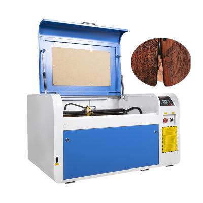 China Mini Acrylic Wood Hobby Cnc Yag Non Metal 100w CO2 Fiber Laser Engraving Air Cooled Cutting Machines for sale