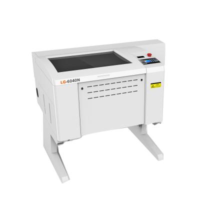 China Mini Pigmentation 6040 Laser Cutting Machine CNC Vein Advance Knife Name Letters Water-cooled Mechanical Material Logo Cutter Co 2 Jinan for sale