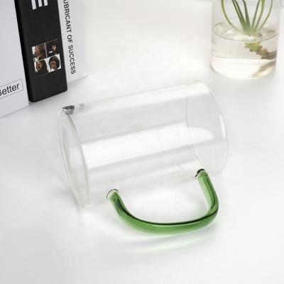 China Sustainable Transparent Glass Cup With Handle Drinking Reusable Water Cup 400ml for sale