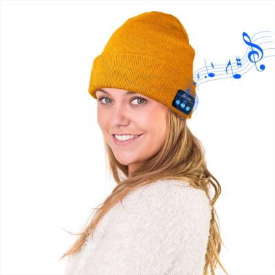 China Chunky Pom Pom Slouchy Knitted Beanie Winter Wireless Earphone Earphone Hat for sale