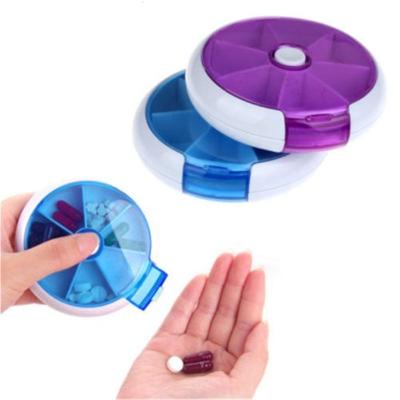 China Factory wholesale round portable storage box plastic seven-day rotating jewelry box 9.2*9.2*2.5 for sale