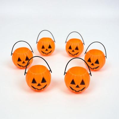 China PE Mini Pumpkin Trick or Treat Buckets Bulk Halloween Candy Holders Container for Kids Halloween Goodie Bags for sale