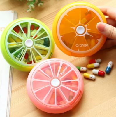 China UXCELL Travel Fruit Style Plastic Cute Button Turn Weekly Medicine Tablet Pill Box Case JHyh-007 for sale