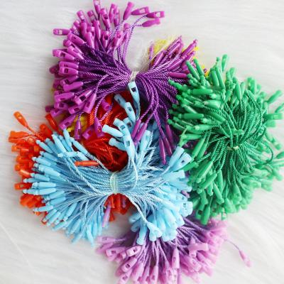 China Colourful Hang Tag Strings Plastic Garment Seal Lockable Polyester String For Clothes for sale