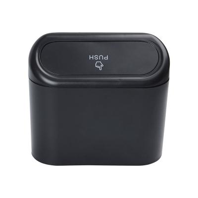 China ABS Car Trash Bin Hanging Vehicle Garbage Dust Case Storage Box Plastic Pressing Square Trash Can Type Auto Car Interior Accessories for sale