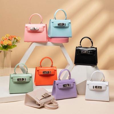 China Unique Design Cute Mini Children Girls Handbags Crossbody Bag Kids Drop Jelly Bags 2022 Toddler Blank Purses for sale