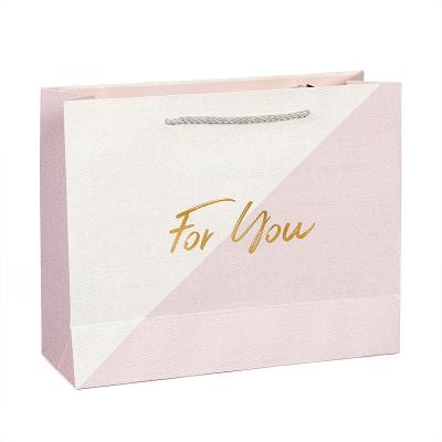 China Custom With Logo Handles Ribbon Personalized Pink Gift Paper Bags Clothes Shoe Brand Retail Luxury Shopping Paper Bags en venta