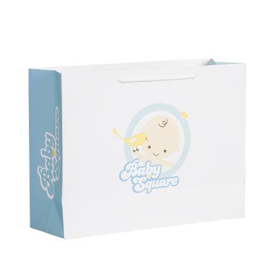 China Custom logo baby cloth white art paper bag with handle with your logo en venta