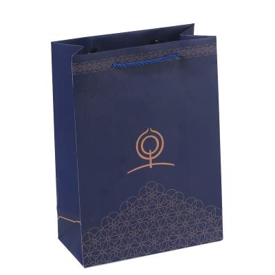 China Wholesale Paper Bags With Your Own Logo Brown Kraft Paper Bag With Handle en venta