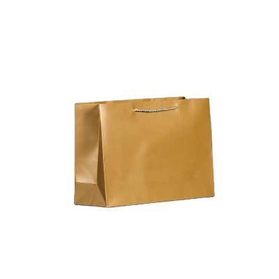 China Customized Packaging Paper Bags Printed Logo with Ribbon Handle for Clothes à venda