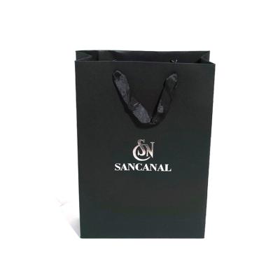 China Wholesale custom shopping tote paper gift bags with your own logo en venta