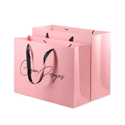 China Custom Printed Personalized Pink Matte Laminated Retail Shopping Euro Tote Paper Bag With Logos en venta