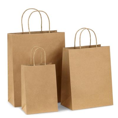 China Custom Printed Brown Kraft Shopping Paper Bag With Handles en venta