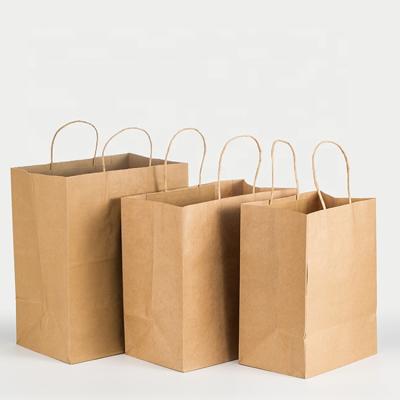 China Brown Custom Printed Logo Food Portable Kraft Paper Bag For Restaurant Packaging en venta