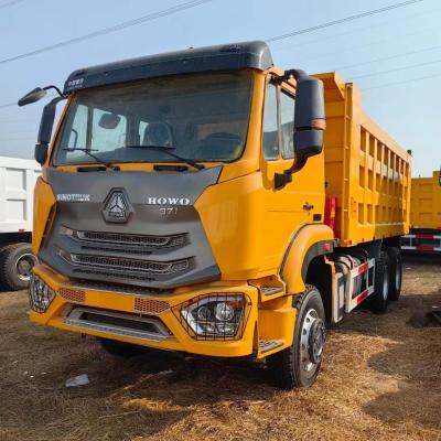 中国 SINOTRUCK HOWO 12輪のスプリングサスペンションタイヤ付きの中古ダンプトラック 販売のため