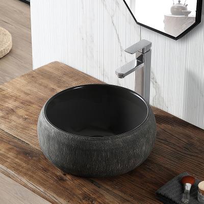 China Viable Modern Sanitary Ware Art Basin Round Hand Wash Ceramic Countertop Basin Sink For Bathroom for sale