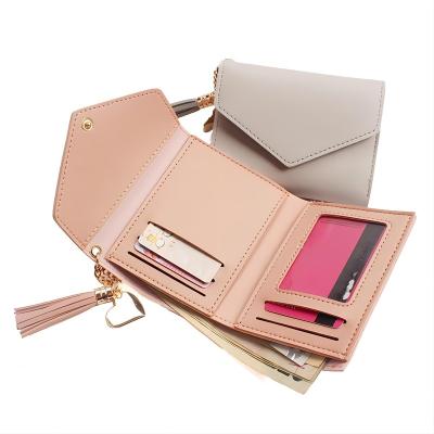 China Fashion Style Factory Wholesale PU Leather Wallet Triple Button Wallet With Tassel Ladies Wallet Multi Card Holder for sale