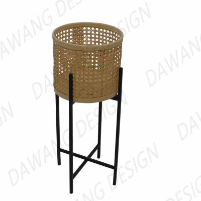 China Sustainable Ironwork Flower Stand With PLI FOOT Woven Rattan Basket for sale