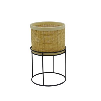 China Assemble rattan log rack with iron base design the new for sale