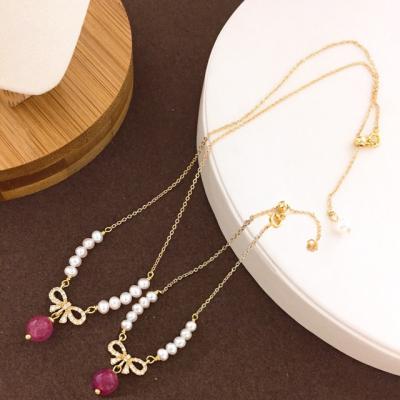 China FASHIONABLE Korean Gold Plated 14K Zircon Bowknot and Strawberry Crystal Jewelry Pendant Set Natural Freshwater Pearl Necklace Bracelet Set for sale