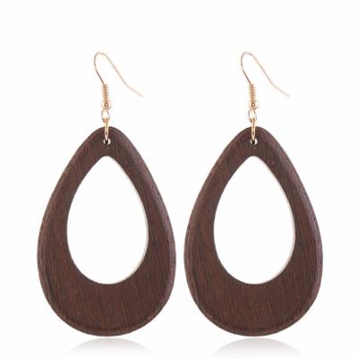 China Hot Selling Fashion Water-drop Amazon Environmental Protection Rough Wood Treatment Bohemian Creative Brown Wooden Hollow Jewelry Dangle Earrings for sale