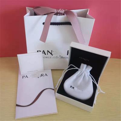 China Handmade High Quality Jewelry Packaging Box Small Charm Bag Ribbon Packaging Box for sale