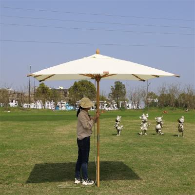 China Modern Bamboo Umbrella 2.3x2.3m Large Center Pole Center Patio Umbrella Modern Outdoor Garden Patio Umbrella for sale