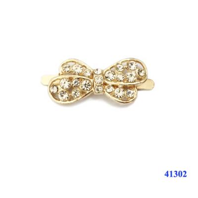 China Custom Mini Ladies Shoe Clips Decorative Metal Shoe Buckle Bow Shoe Accessories for sale