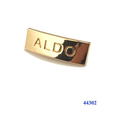 China Shoe Buckle Light Gold Color Metal Labels Brand Logos , Metal Tags Labels For Bags for sale