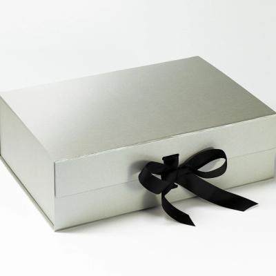 China Handmade Custom Silver Gray Folding Cardboard Box Gift Box With Black Ribbon for sale