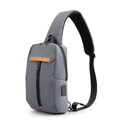 China Custom Fashion Front Package Men Cross Body Shoulder Chest Pocket Sling Stylish Bag With USB Cable for sale